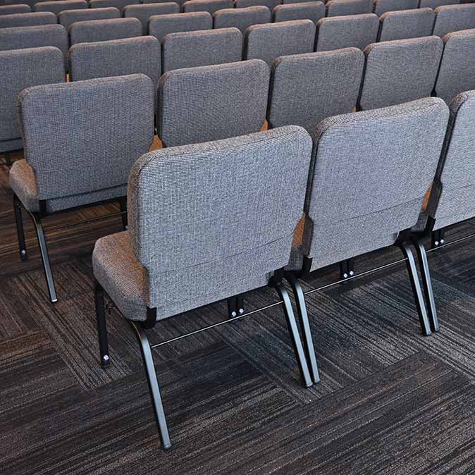 Close up back view of chairs in rows at Grace Life Church