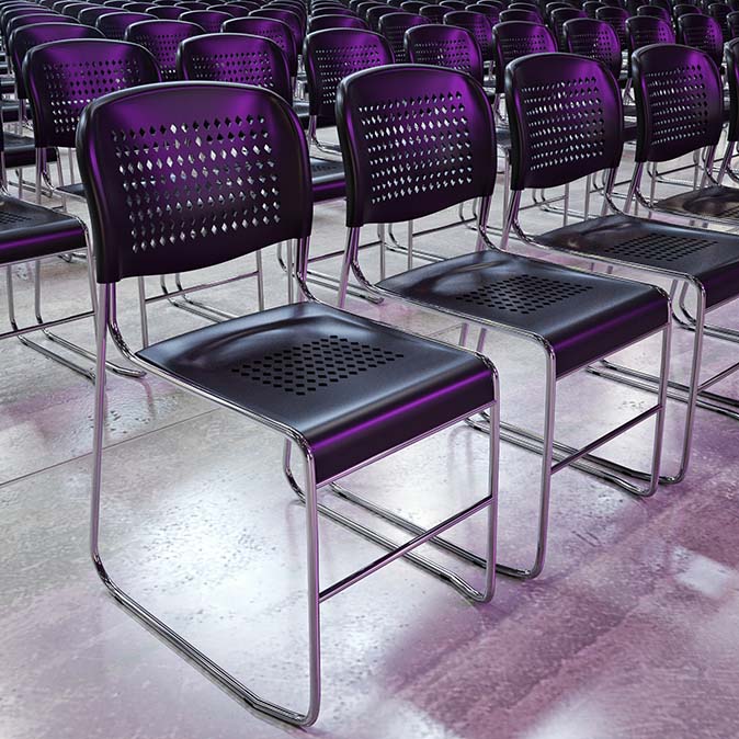 A close up of HD Core chairs in a public assembly space