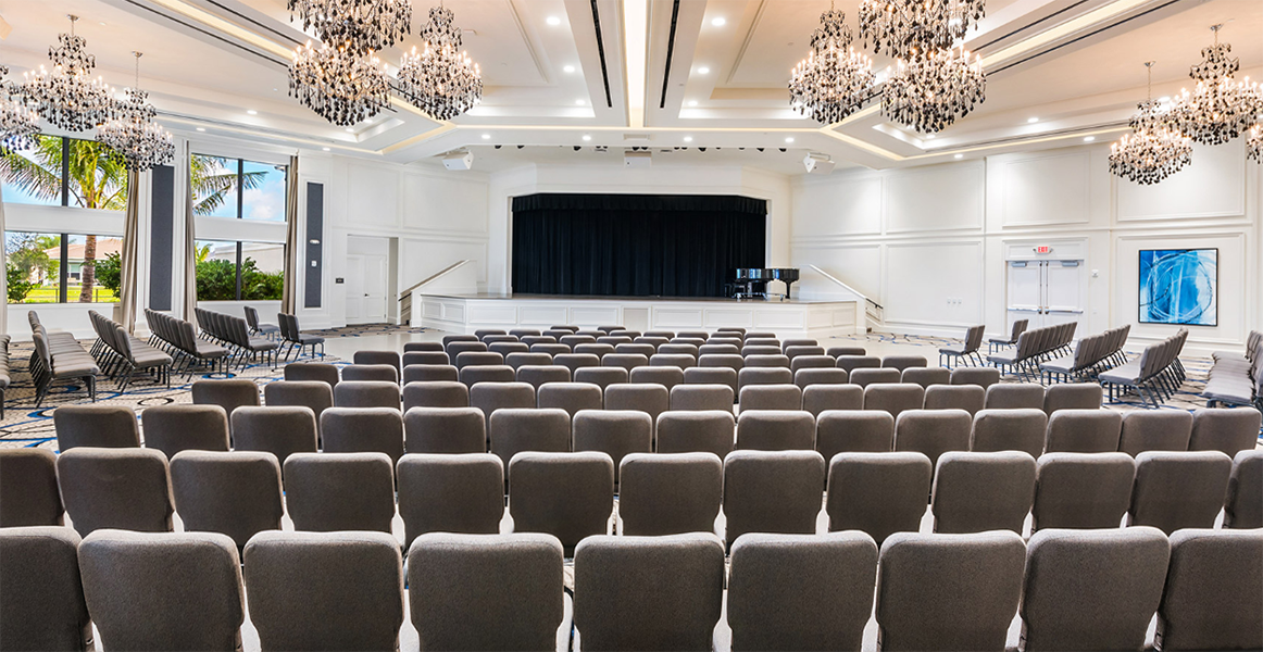 Row of Bertolini Chairs facing a main stage