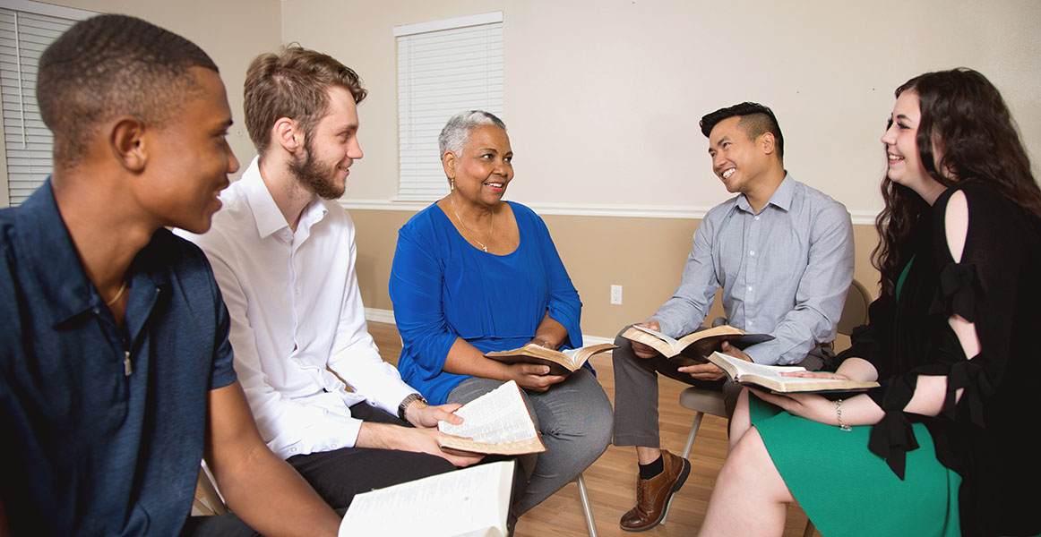 Diverse worship group in a discussion