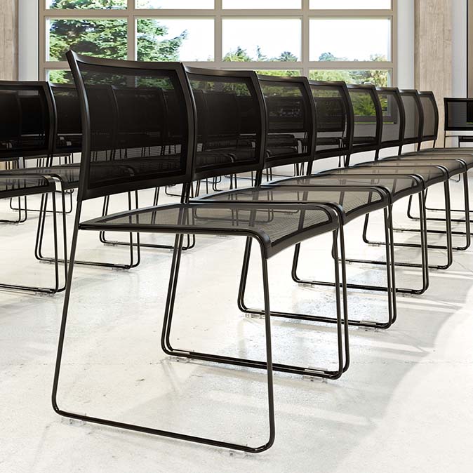 A close up of HD Premier chairs in a worship hall