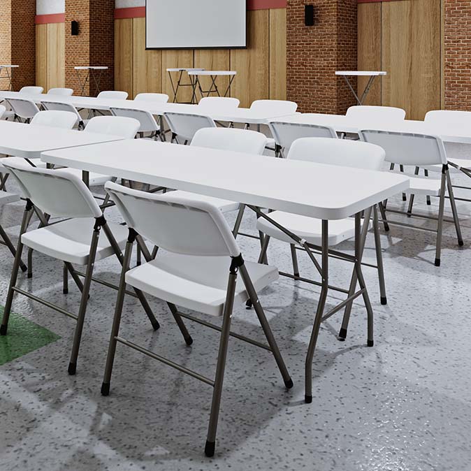 Brisa Rectangle Tables arranged in rows in a large multipurpose room