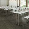 Brisa Rectangle Tables arranged in rows for an outdoor wedding