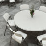 A close up of Brisa chairs around a table