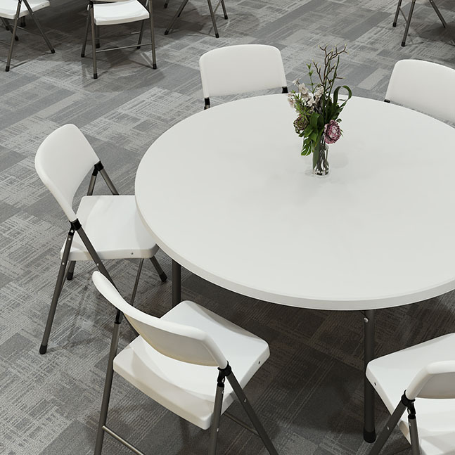 A close up of Brisa chairs around a table