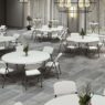 Many Brisa round tables arranged in a social worship setting