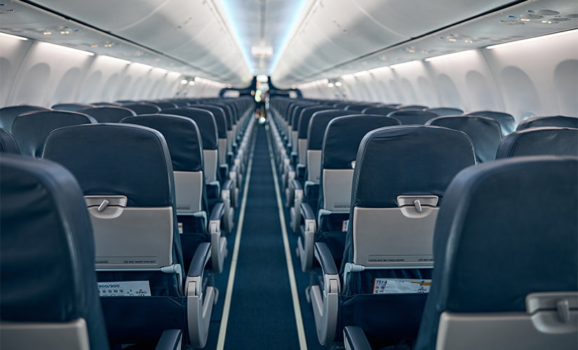 Image of an airplane aisle way