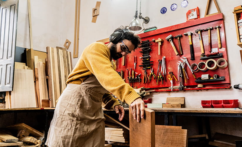Photo of a man working in a wood shop
